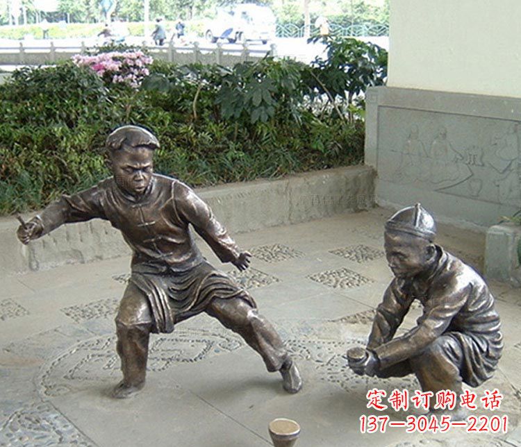 昆明打陀螺的儿童铜雕