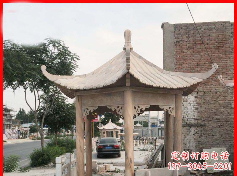 昆明公园晚霞红六角石凉亭雕塑