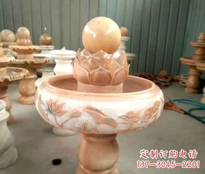 昆明石来运转晚霞红风水球喷泉石雕