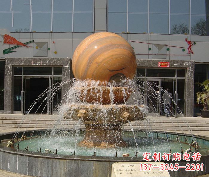 昆明石来运转球晚霞红风水球石雕