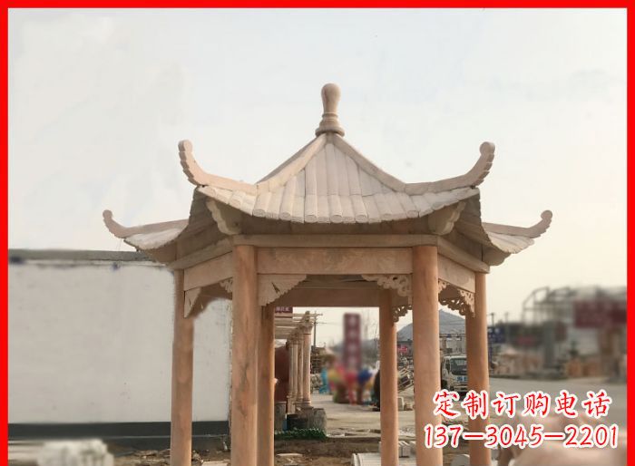 昆明晚霞红公园六角石雕凉亭
