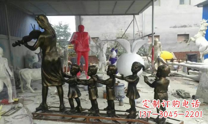 昆明校园老师和儿童铜雕